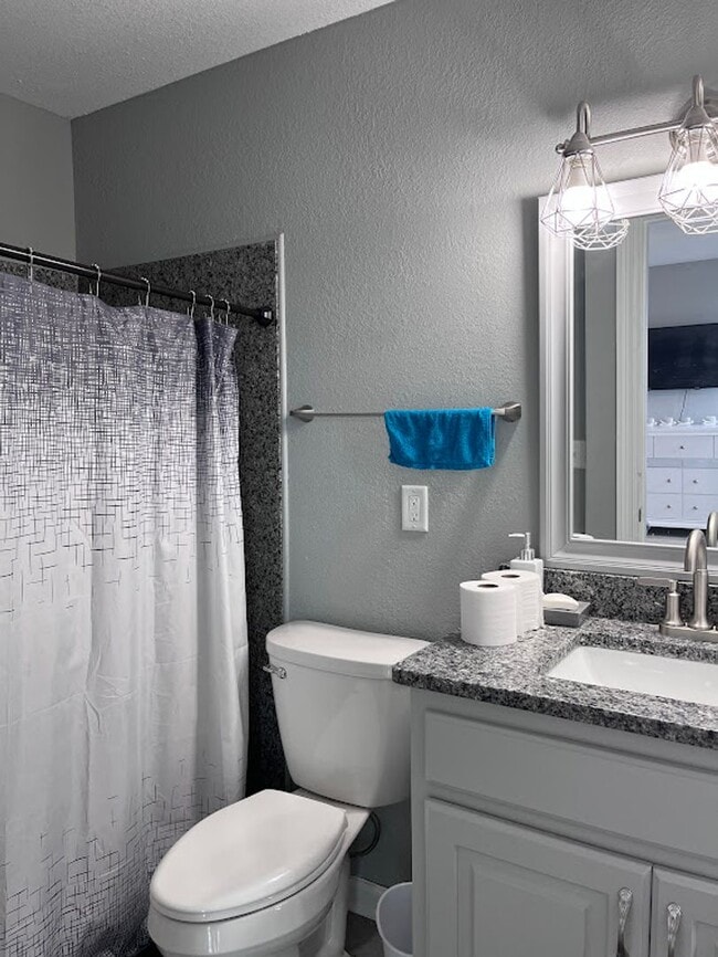 Building Photo - Enjoy this view from your balcony at  Bayou Pointe Villas