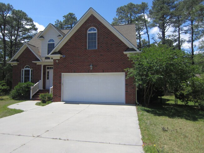 Building Photo - Live Where Others Vacation | 4BR Unique Home in the Gated Community of Fairfield Harbour!