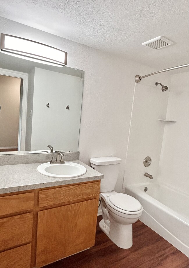 Step into elegance with this modern bathroom, designed for relaxation and functionality. - One Park View