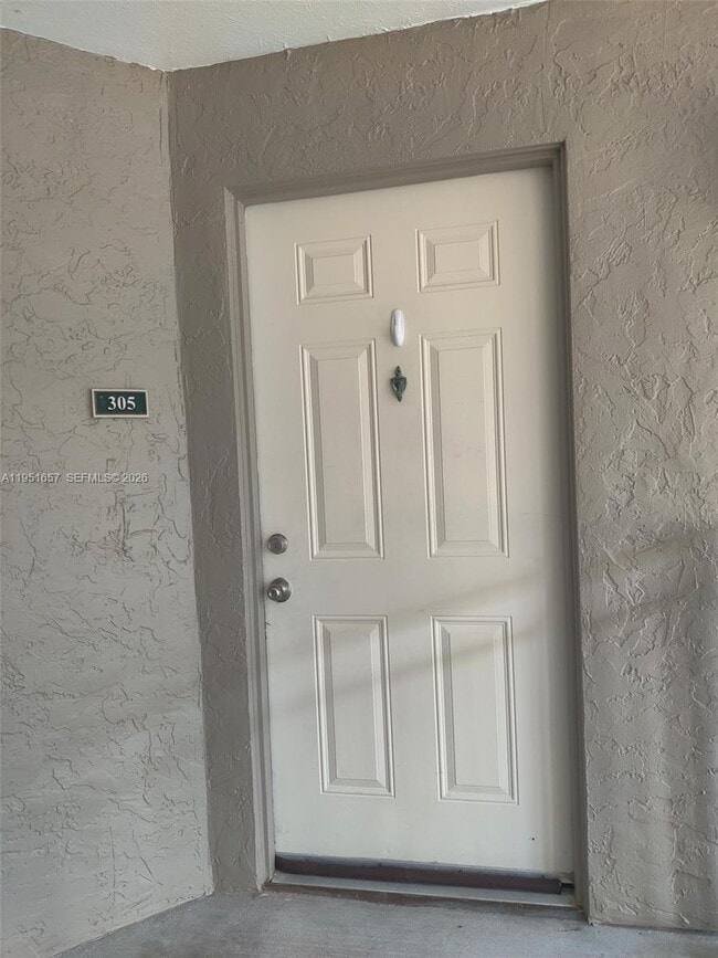 Building Photo - 1865 Palm Cove Blvd