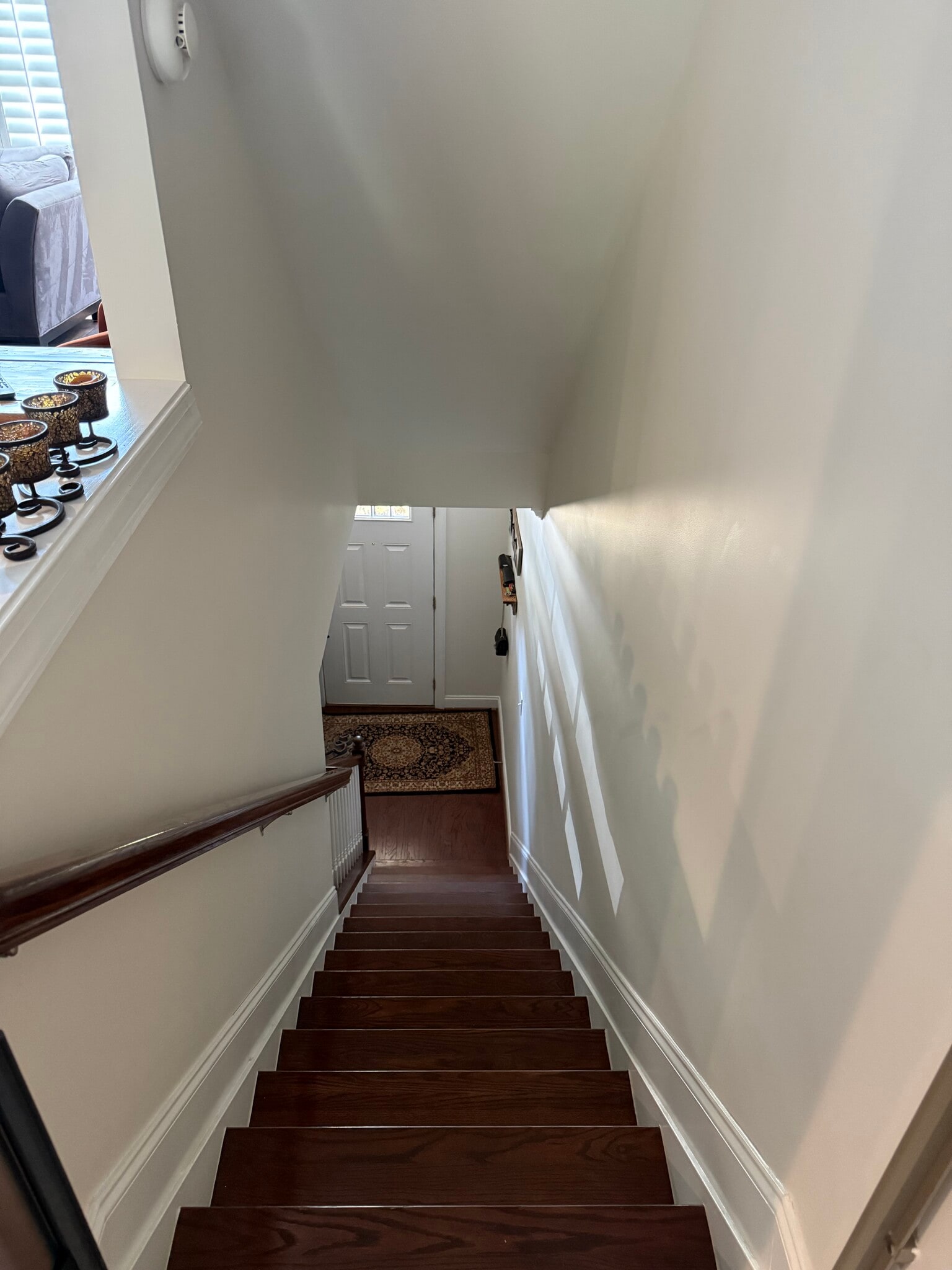 Down stairs to entry way. Dog / child gate at the top. - 2615 Stewart Pines Dr