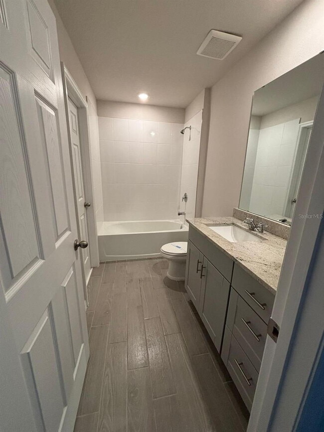 Building Photo - This beautiful townhouse features an abundance of space and natural light.