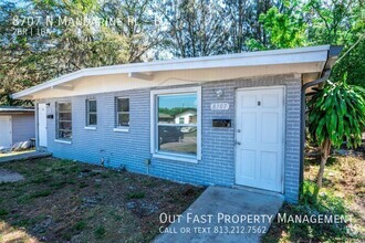 Building Photo - 8707 N Mandarine Pl