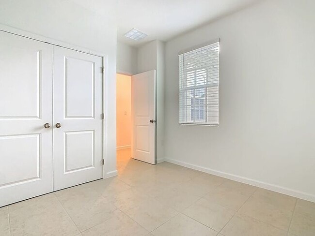 Building Photo - New Luxury Townhome in Celebration, FL Corner unit. All porcelain tiled floors. Aleutian model by...