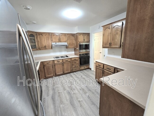 Building Photo - 11100 Hughlan Dr