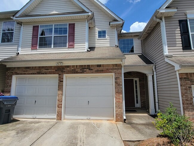 Building Photo - Peaceful 2-Story Townhome - Soothing sound...
