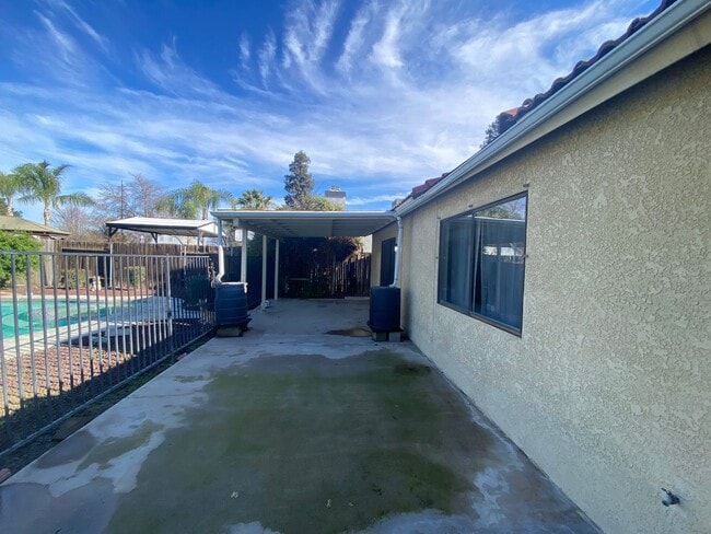 Building Photo - Get ready for Summer in this 3 BD 2 BA SW home with a Pool on a corner lot