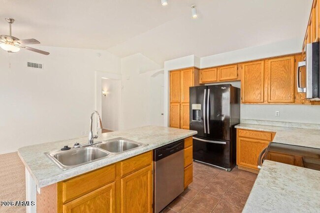 Building Photo - 6585 N 77th Dr