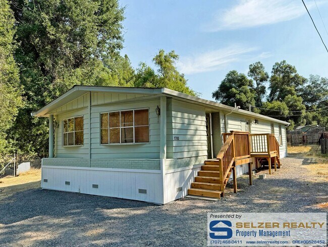Primary Photo - Roomy 2 bd. mobile w/ big yard in a countr...