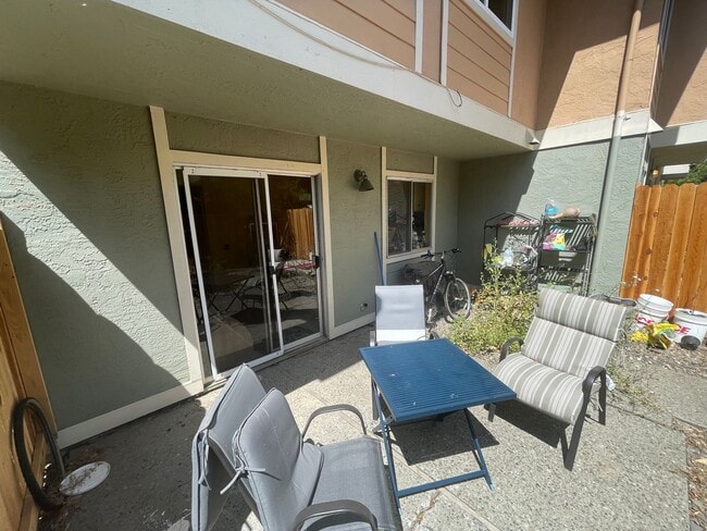 Building Photo - Step into a beautifully refreshed 3-bedroom, 1.5-bath condo that blends comfort, style, and unbea...