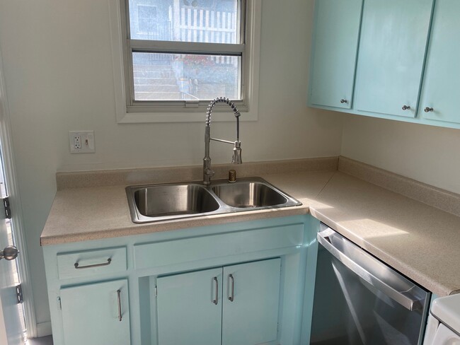 New sink and fixtures - 228 W Walnut Ave