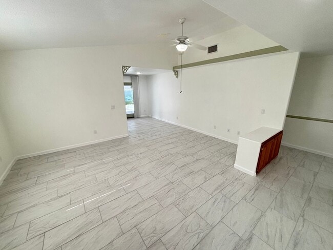 Building Photo - This inviting single-story home boasts a s...