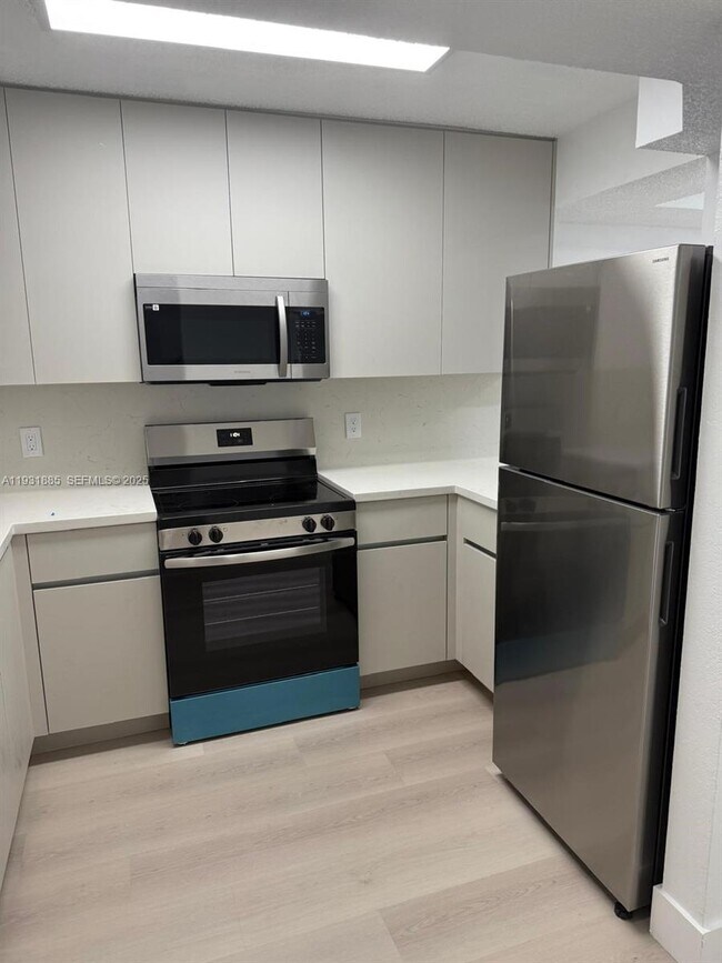 Building Photo - 7835 W 30th Ct