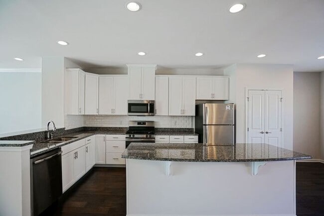 Building Photo - Spacious 3-Story Townhome with Bonus Suite & 2-Car Garage – In the Heart of RTP