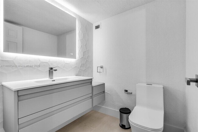 Building Photo - 5401 Collins Ave