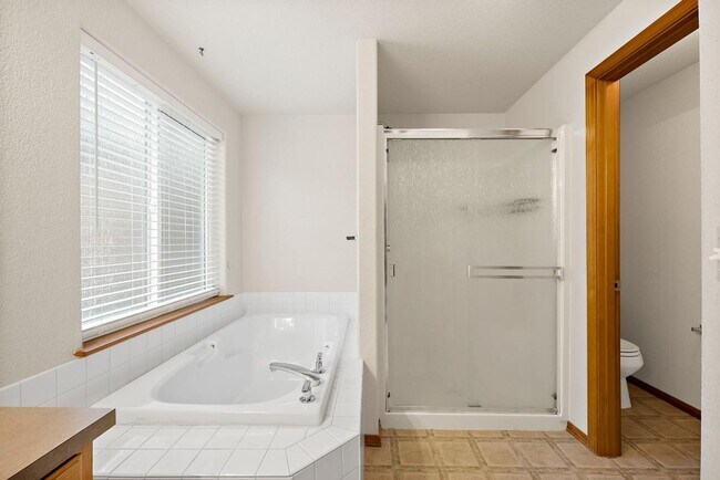 Building Photo - Spacious 4-Bedroom Olympia Home with A/C, Stunning Accents & Walk In Pantry!