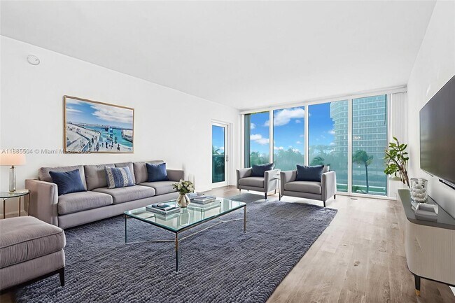 Building Photo - 10275 Collins Ave