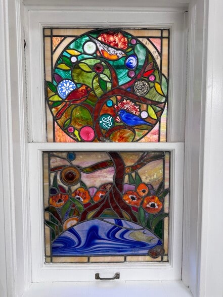 Custom art glass in bathroom downstairs - 3068 Bellerive Dr