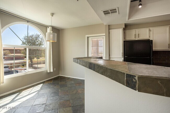 Building Photo - 9451 E Becker Ln