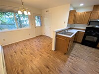 Building Photo - 2 Bed 1.5 Bath Condo! W/S/G/Lawn Care Incl...