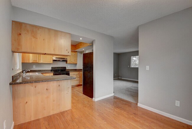 Building Photo - 4 bedroom, 2 bath home with 2 car garage, with mountain views