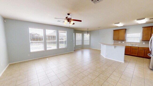 Building Photo - "Spacious 5-Bedroom Oasis with Pool on Gri...