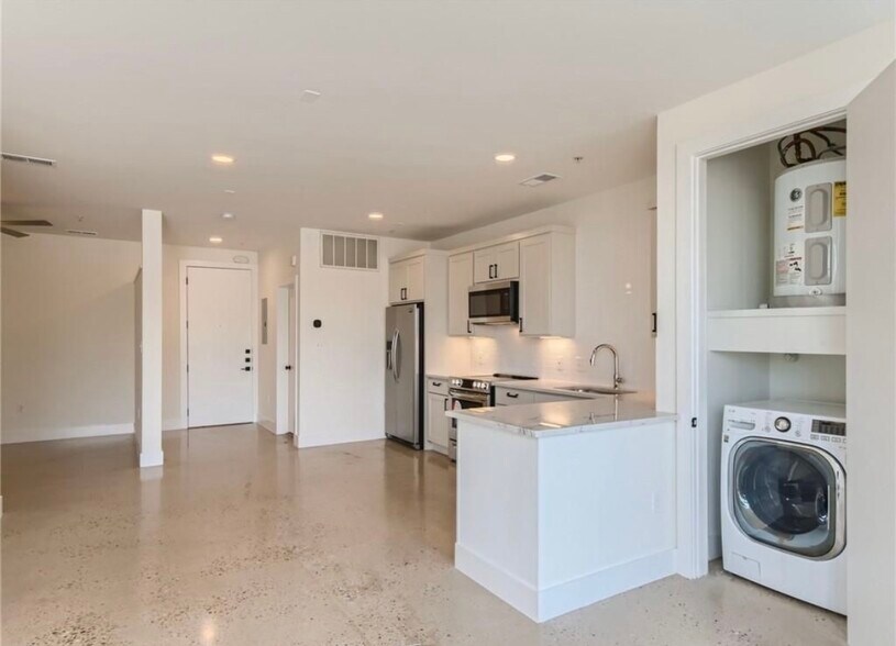 Polished concrete floors, all in one washer/dryer unit. - 2906 S 1st St