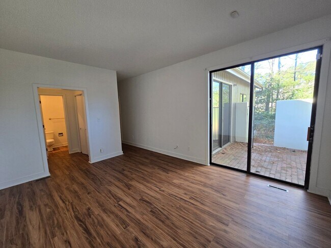 Building Photo - Multigenerational or Grad Student Living! Spacious One-Story End Unit in Prime Location on 54