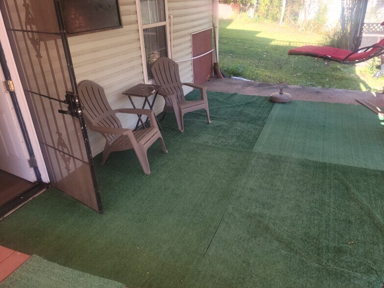 Porch with entry and exit door - 5898 Manchester Ln