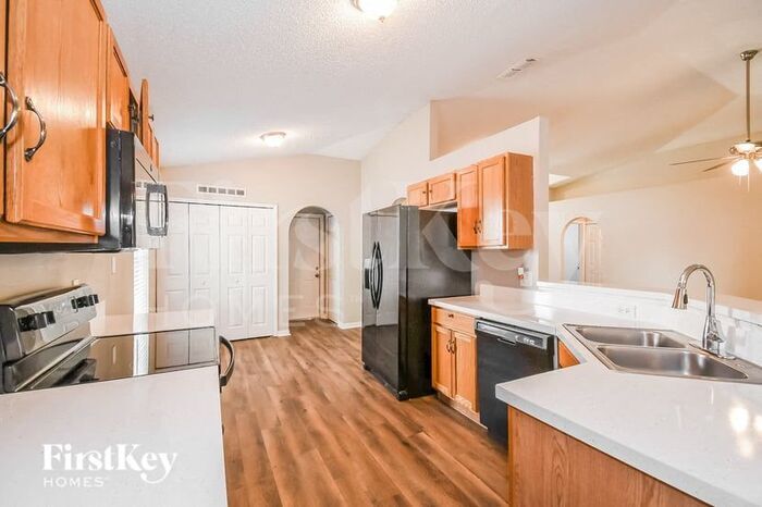 Building Photo - 8153 Misty Meadow Ct N
