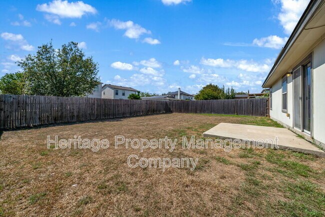 Building Photo - 4935 Dahlia Terrace