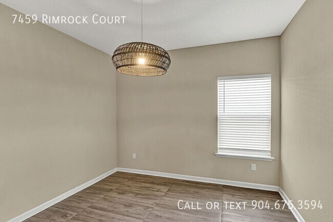 Building Photo - 7459 Rimrock Ct
