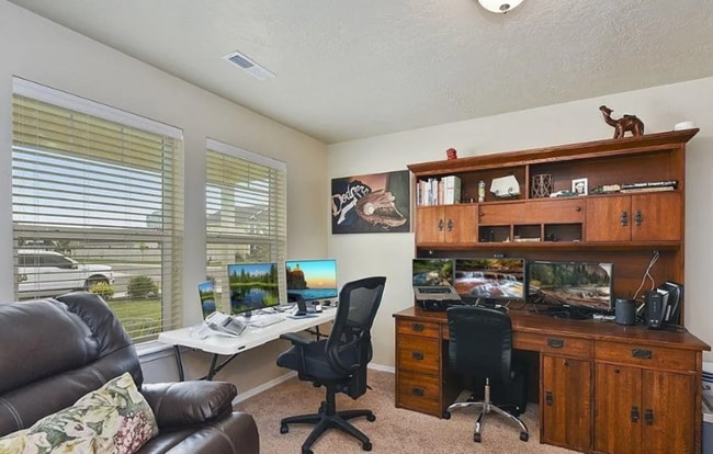 Building Photo - 12370 W Hollowtree Ct