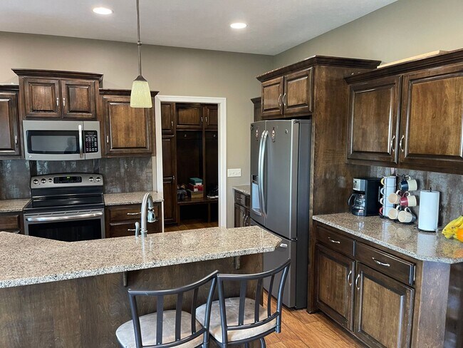 Building Photo - Spacious 4-Bedroom with Office, Drop Zone,...