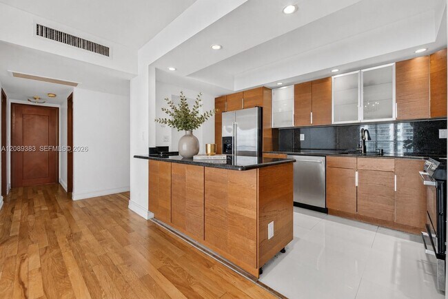 Building Photo - 19380 Collins Ave