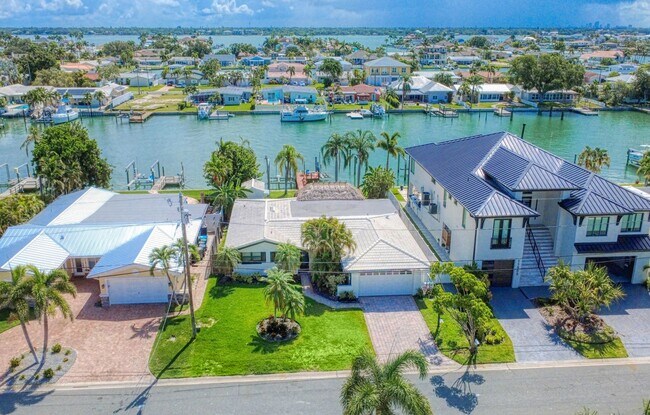 Building Photo - Treasure Island Three Bedroom, Two Bath Furnished Single Family Home on the water.