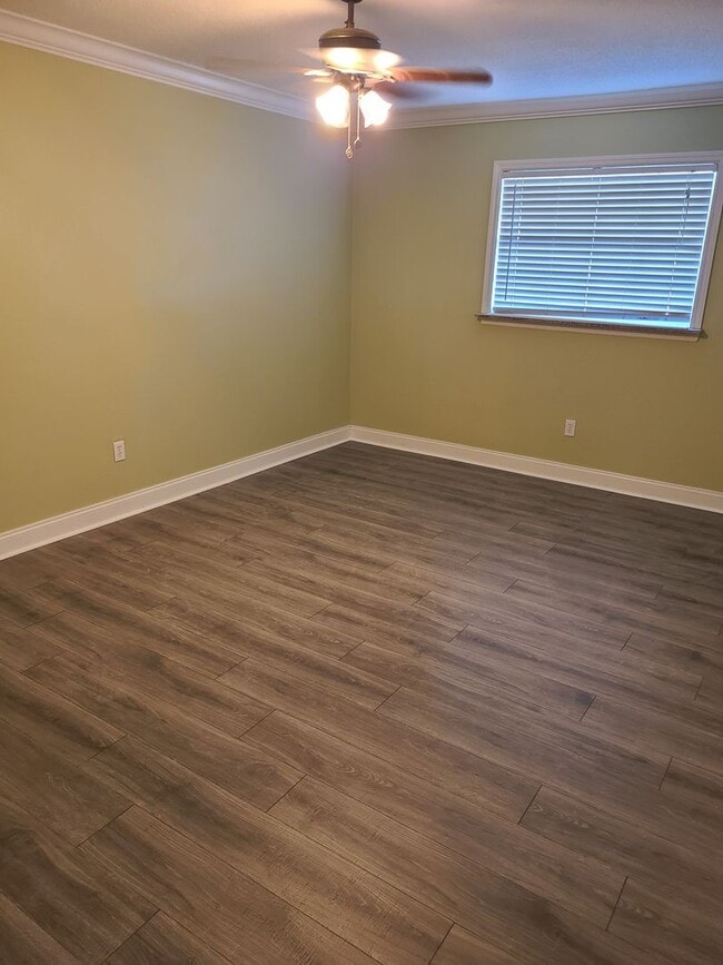 Building Photo - 1.1 New laminate flooring - looks amazing- Community Pool and Laundry facility