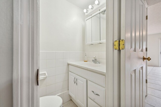 Building Photo - "Spacious 2-Bed Condo with Modern Upgrades...