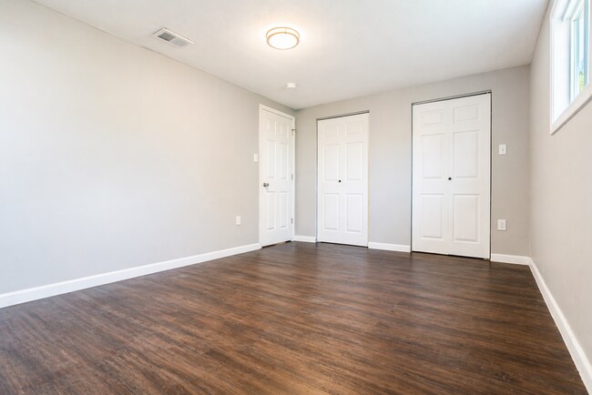 Building Photo - This charming 5-bedroom, 2-bathroom home is available for $2,000/month.
