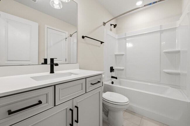 Building Photo - Move-In Ready 4BR Home | Deck, Patio & Open Concept Living