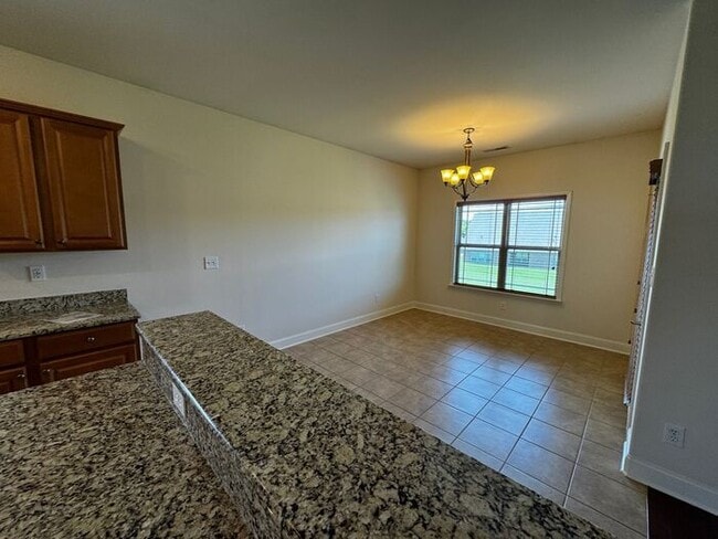 Building Photo - Available now in amazing location