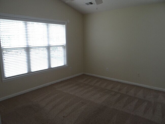Building Photo - Lovely 3 bedroom 2 bath home in 55 and older neighborhood with 2 car garage