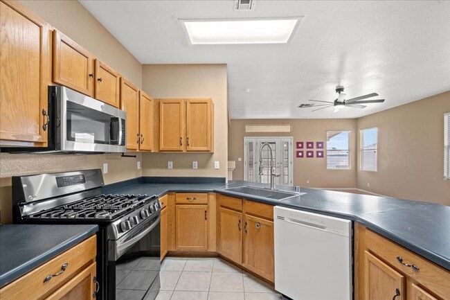 Building Photo - Charming Centennial Hills Home with Hardwood Floors & Covered Patio