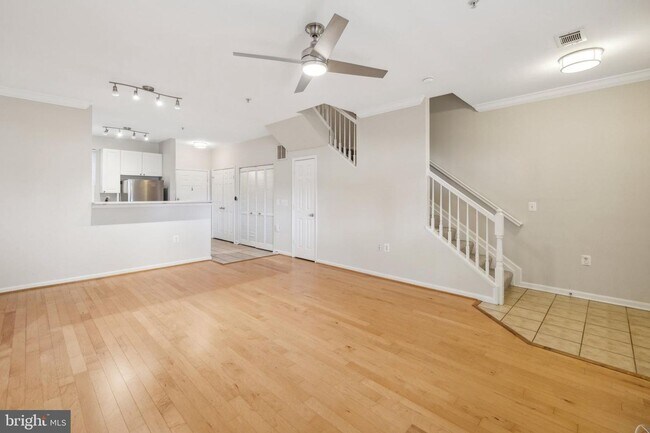 Building Photo - This townhouse style condo is located across the street from the Vienna Metro Station (Orange Line).