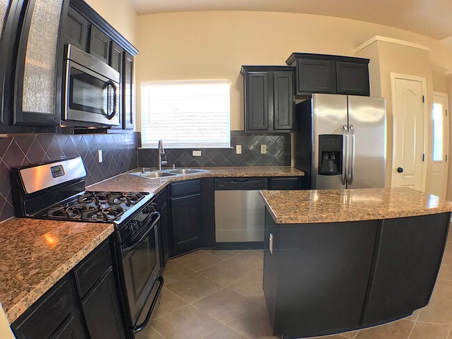 Building Photo - Northeast El Paso 4 Bed Refrig A/C