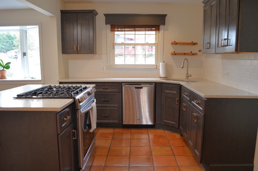Solid surface counters, newer stainless appliances - 45 Emerson Rd
