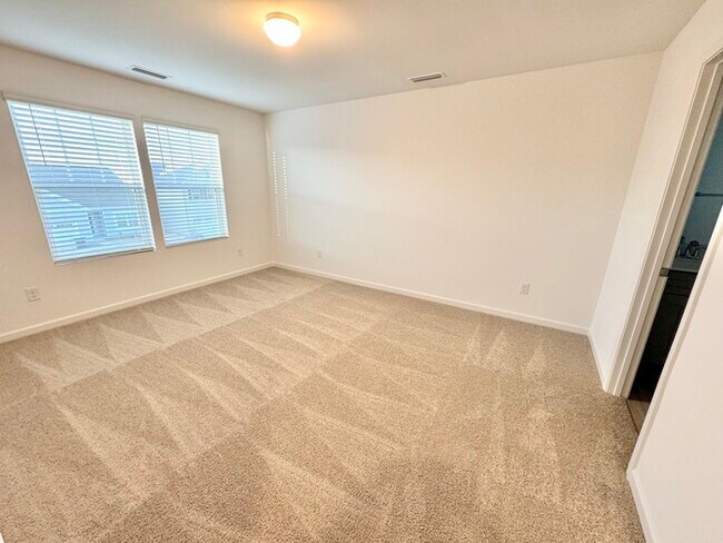 Building Photo - Three bedroom 2 1/2 bath single-family home in the new Kensington community