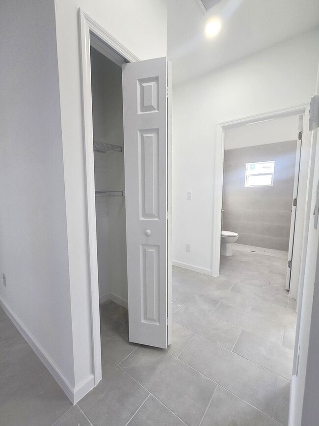 Building Photo - Brand New 2/2/1-PRIME SW LOCATION - Lehigh Acres