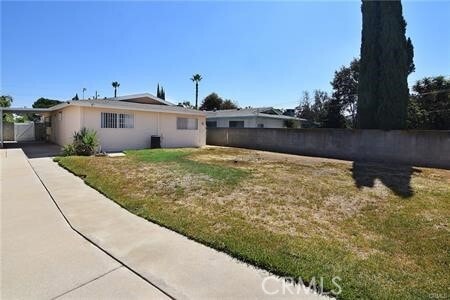 Building Photo - 4945 Persimmon Ave