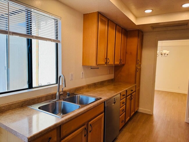 Building Photo - Tastefully updated 2 bedroom/2 bath, single level townhome w/attached 2 car garage!